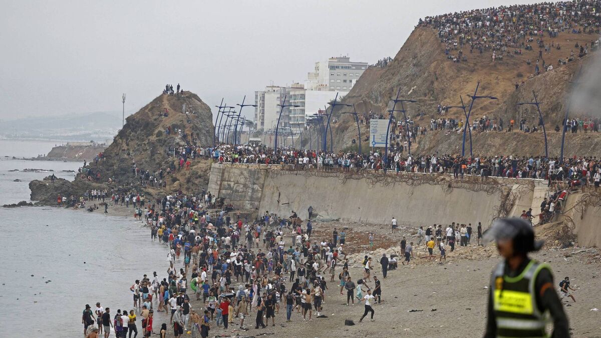 At least 57 people die as up to 60,000 cross to Spanish enclave of Ceuta from Morocco