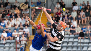 <p>William Buckley of St Finbarr's clashes with Midleton's Ciarmhac Smyth. Pic: Howard Crowdy</p>