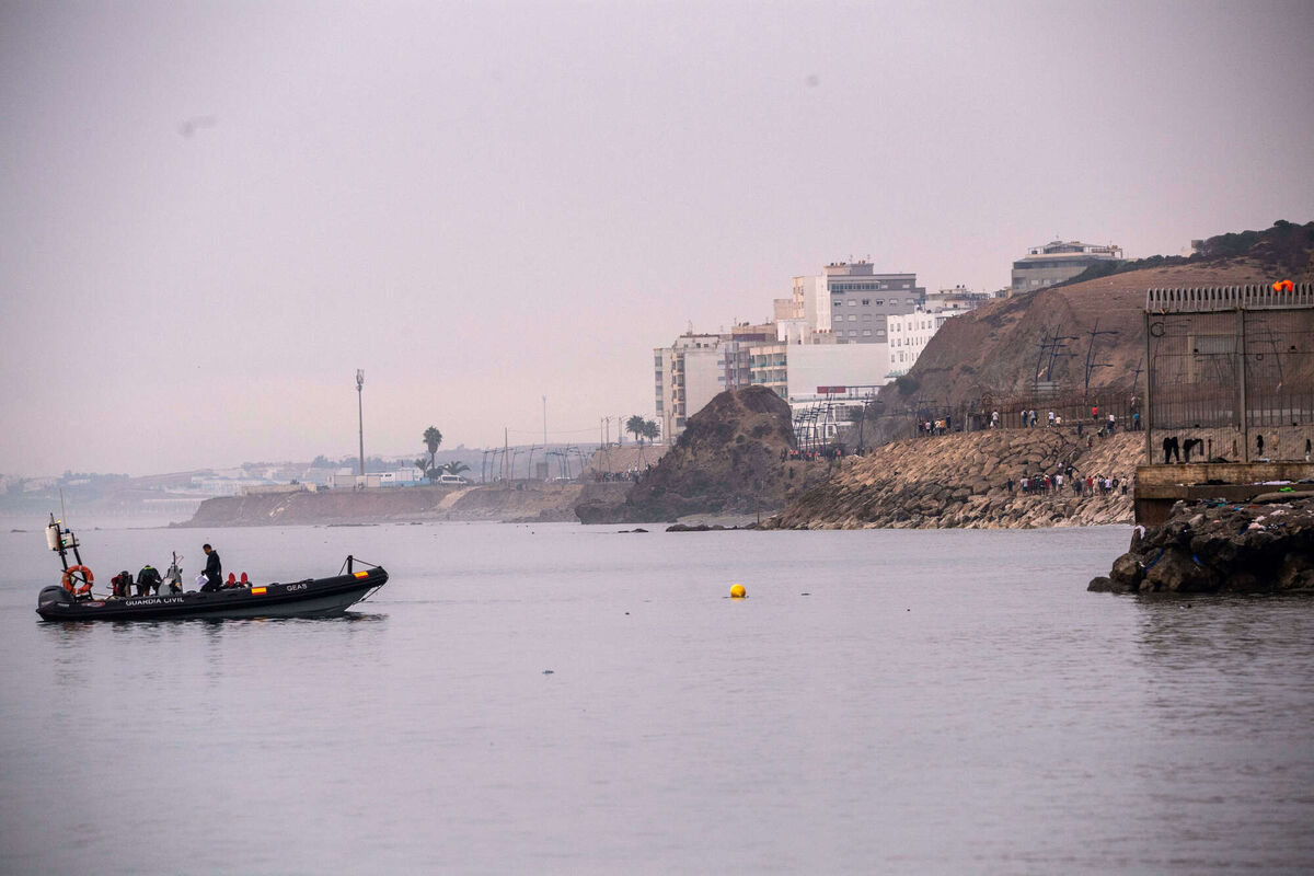 Migrants return to Morocco from the Spanish enclave of Ceuta, Saturday, Aug. 1, 2026. (AP Photo/Antonio Sempere) Migrants return to Morocco from the Spanish enclave of Ceuta, Saturday, Aug. 1, 2026. (AP Photo/Antonio Sempere)