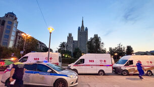 Emergency vehicles in an area near a deadly explosion at a restaurant in Moscow (Sergei Vedyashkin/Moscow News Agency via AP)