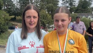 <p>All-Ireland U16 champion Connie Mallon with her mother Dervla - All-Ireland senior champion.</p>