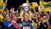 Helena Cummins lifts the Mary Quinn Memorial Cup 2/8/2026