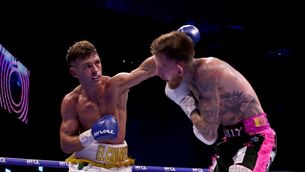 <p>Gary Culley (right) in action against Lee Reeves at 3Arena, Dublin. Pic: Damien Eagers/PA Wire.</p>