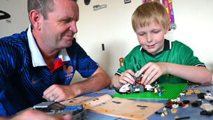 <p>10-year-old Kye Lenihan playing Lego with his dad Terry. Pictures: Larry Cummins</p>