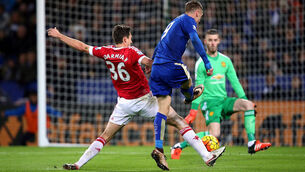 Leicester have to settle for a draw despite Jamie Vardy's record-breaking goal