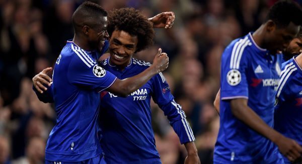 Willian celebrates scoring the winning goal with Ramires at Stamford Bridge. Photo: Andrew Matthews/PA