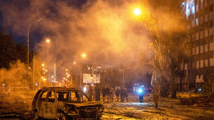 A burned car is seen after a Russian missile attack in Kyiv, Ukraine (Dan Bashakov/AP)