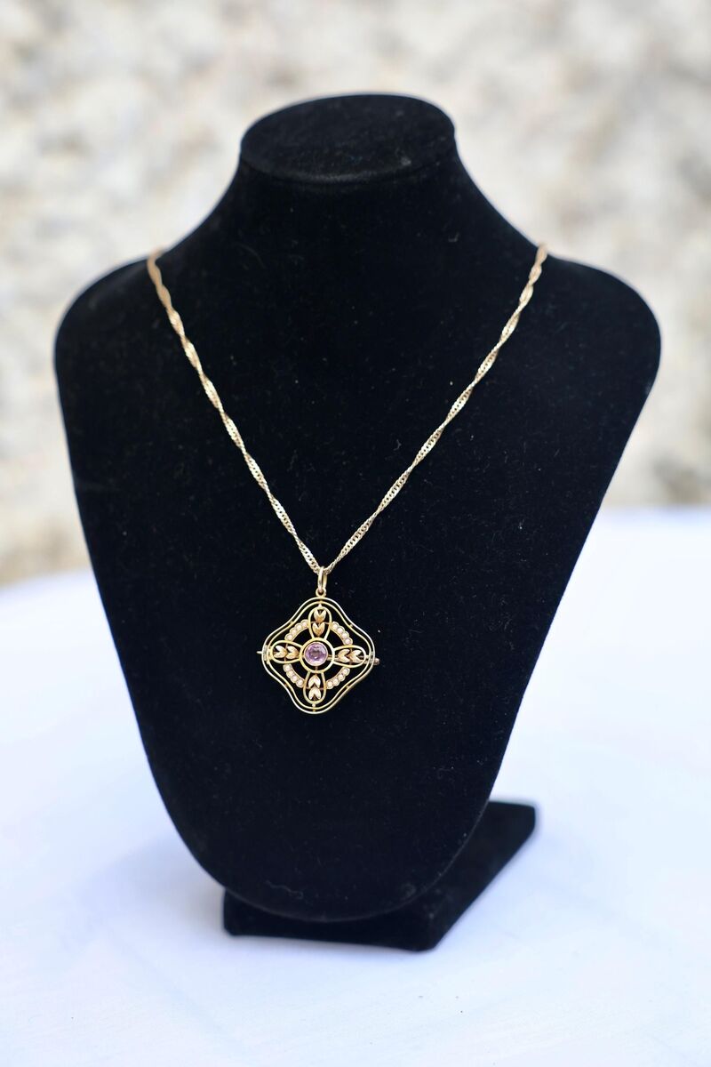 A c1900 pink tourmaline and half-pearl brooch pendant. A c1900 pink tourmaline and half-pearl brooch pendant.