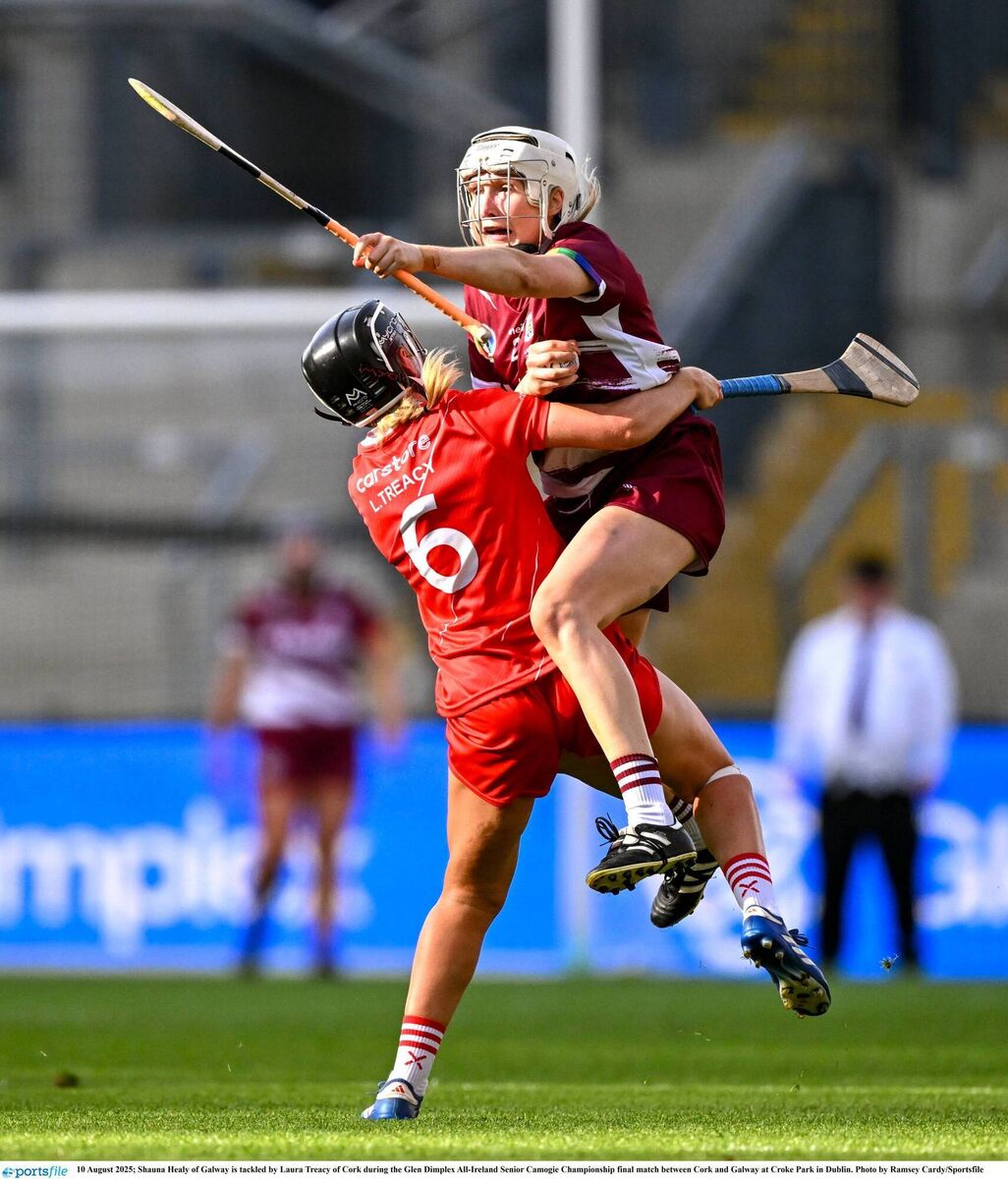 Shauna Healy of Galway is tackled by Laura Treacy of Cork during the 2025 All-Ireland camogie final. Pic: Ramsey Cardy/Sportsfile