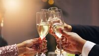 Hands, group and toast champagne at party in celebration, goals or connection for success in career at night. Business people, d