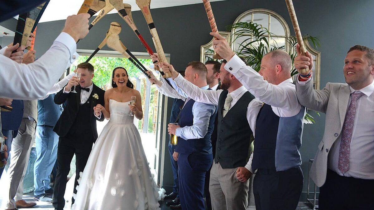 Wedding of the Week: Gillian and Nicky greeted by Mayfield GAA clubmates' guard of honour
