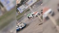 Watch: Ukrainian market vendor hunted by drone