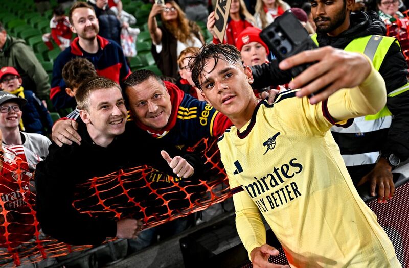 Theo Julienne of Arsenal takes a selfie with supporters after the pre-season friendly match between Arsenal and Real Betis at the Aviva Stadium in Dublin. Photo by Tyler Miller/Sportsfile Theo Julienne of Arsenal takes a selfie with supporters after the pre-season friendly match between Arsenal and Real Betis at the Aviva Stadium in Dublin. Photo by Tyler Miller/Sportsfile