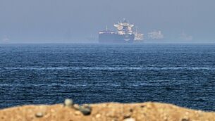 <p>Cargo ships are seen at sea near the Strait of Hormuz (AP)</p> <p>Cargo ships are seen at sea near the Strait of Hormuz (AP)</p>