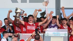 <p>Cork's Joe Miskella lifts the Electric Ireland GAA All-Ireland MFC trophy. Pic: Bryan Keane/Inpho</p>