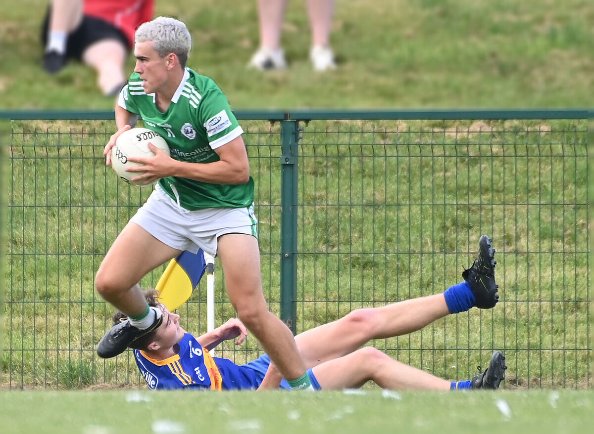 Ballincollig's Joe Miskella leaves Carrigaline's David Scannell Murphy on the ground during the Cork ETB Rebel Óg P1 MFC at Carrigaline in July. Pic: Eddie O'Hare Ballincollig's Joe Miskella leaves Carrigaline's David Scannell Murphy on the ground during the Cork ETB Rebel Óg P1 MFC at Carrigaline in July. Pic: Eddie O'Hare