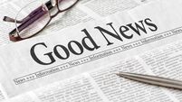 A newspaper with the headline Good news