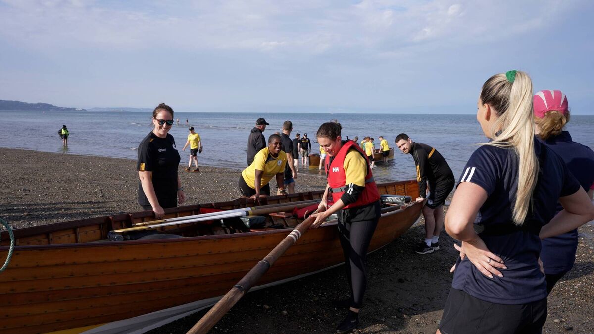 Participants prepare to take part in a rowing event at a previous HER Outdoors week.