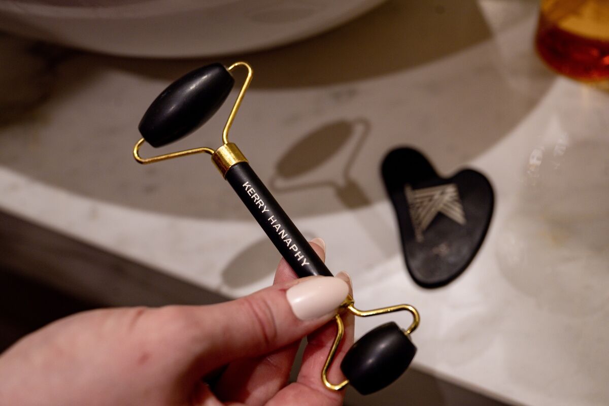 Breda tries a Kerry Hanaphy skin roller.