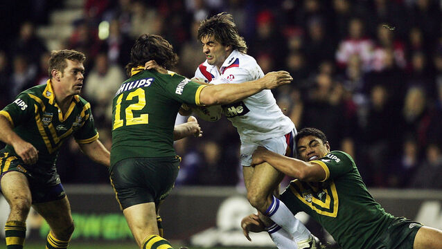 <p>POWERHOUSE: Brian Carney of Great Britain is stopped by Nathan Hindmarsh of Australia during the Gillette Tri-Nations match between Great Britain and Australia at the JJB Stadium in 2004. Picture: Clive Mason/Getty Images</p>