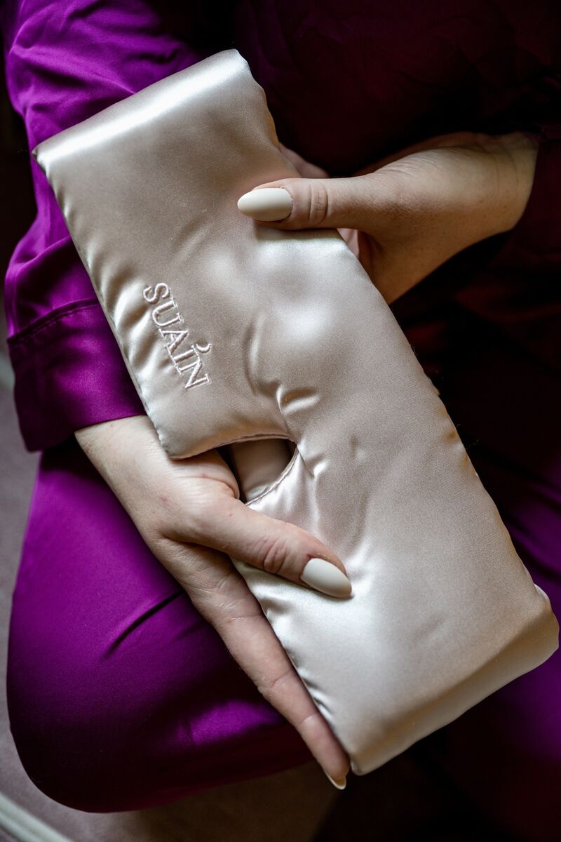 Breda Graham examines a Suain silk eye mask.