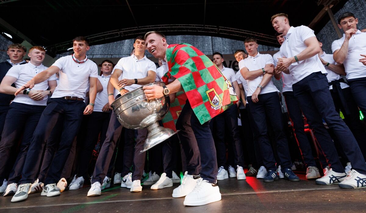 Ryan O'Donoghue lifts the Sam Maguire Cup at the homecoming. Picture: INPHO/James Crombie