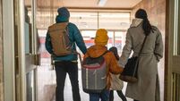Homeless Family.jpg Happy family on train station