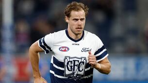 <p>Jake Kolodjashnij of the Cats warms up. Pic: Michael Willson/AFL Photos via Getty Images</p>