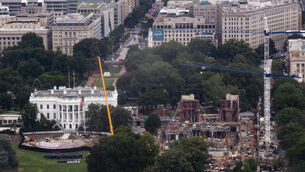 Construction continues on a helipad and the White House ballroom on the South Lawn of the White House, Washington DC (Tierney L Cross/AP) Construction continues on a helipad and the White House ballroom on the South Lawn of the White House, Washington DC (Tierney L Cross/AP)