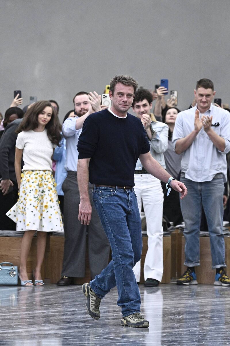 Irish designer Jonathan Anderson acknowledging the audience at the end of Dior's SS2026 RTW Irish designer Jonathan Anderson acknowledging the audience at the end of Dior's SS2026 RTW