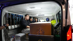 Relatives have been allowed to retreive the bodies of victims at the Debsirin Nonthaburi School (AP) Relatives have been allowed to retreive the bodies of victims at the Debsirin Nonthaburi School (AP)