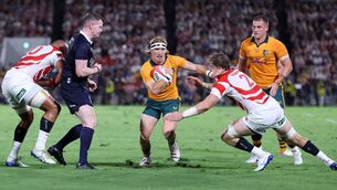 <p>WET AND WILD: Tate McDermott of Australia is tackled by Tiennan Costley of Japan during the Lipovitan D Challenge Cup between Japan and Australia at Hanazono Rugby Stadium on August 8, 2026 in Higashiosaka, Osaka, Japan. Pic: Paul Miller/Getty Images</p>