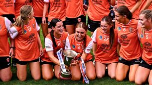 <p>Armagh players Niamh Forker, 10, and Méabh O'Hare celebrate after victory in the Glen Dimplex Premier Junior Championship final match between Armagh and Cavan at Croke Park in Dublin. Photo by Piaras Ó Mídheach/Sportsfile</p>
