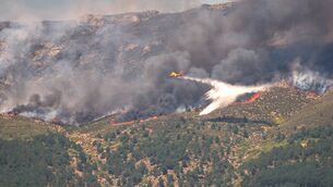 <p>A seaplane drops water onto the fire as a wildfire advances near La Adrada, Ávila province, Spain, this July. File picture: Manu Fernandez/AP</p> <p>A seaplane drops water onto the fire as a wildfire advances near La Adrada, Ávila province, Spain, this July. File picture: Manu Fernandez/AP</p>