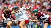 Laura Hayes is tackled by Niamh Niland and Niamh Mallon 9/8/2026