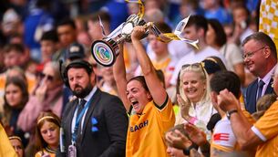 <p>Antrim captain Caitríona Graham lifts the Jack McGrath Cup after her side's victory in the Glen Dimplex All-Ireland Intermediate Camogie Championship final match between Antrim and Laois at Croke Park in Dublin. Pic: Piaras Ó Mídheach/Sportsfile</p>
