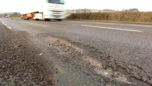 <p>Potholes on the approach to Killeagh on the road from Youghal in Cork. Picture: Larry Cummins</p>