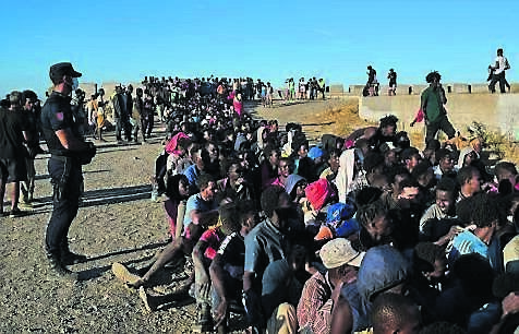 Spanish police and army rounding up migrants who crossed from Morocco into Spain’s African territory of Ceuta. Colin Sheridan highlights the disinformation about the tragedy: ‘Certainty travels quickly. Context arrives late, if it arrives at all.’ Picture: Bernat Armangue/AP Spanish police and army rounding up migrants who crossed from Morocco into Spain’s African territory of Ceuta. Colin Sheridan highlights the disinformation about the tragedy: ‘Certainty travels quickly. Context arrives late, if it arrives at all.’ Picture: Bernat Armangue/AP