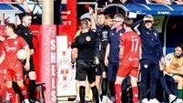 Brian Gartland is awarded a red card after tempers flare between both sides 9/8/2026