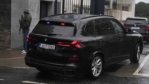 <p>Garda vehicles arriving at the Central Criminal Court in Dublin. Picture: Mark Marlow/PA Wire</p>