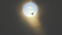 colorful butterfly finds its way out of a dark tunnel, concept of freedom