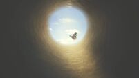 colorful butterfly finds its way out of a dark tunnel, concept of freedom