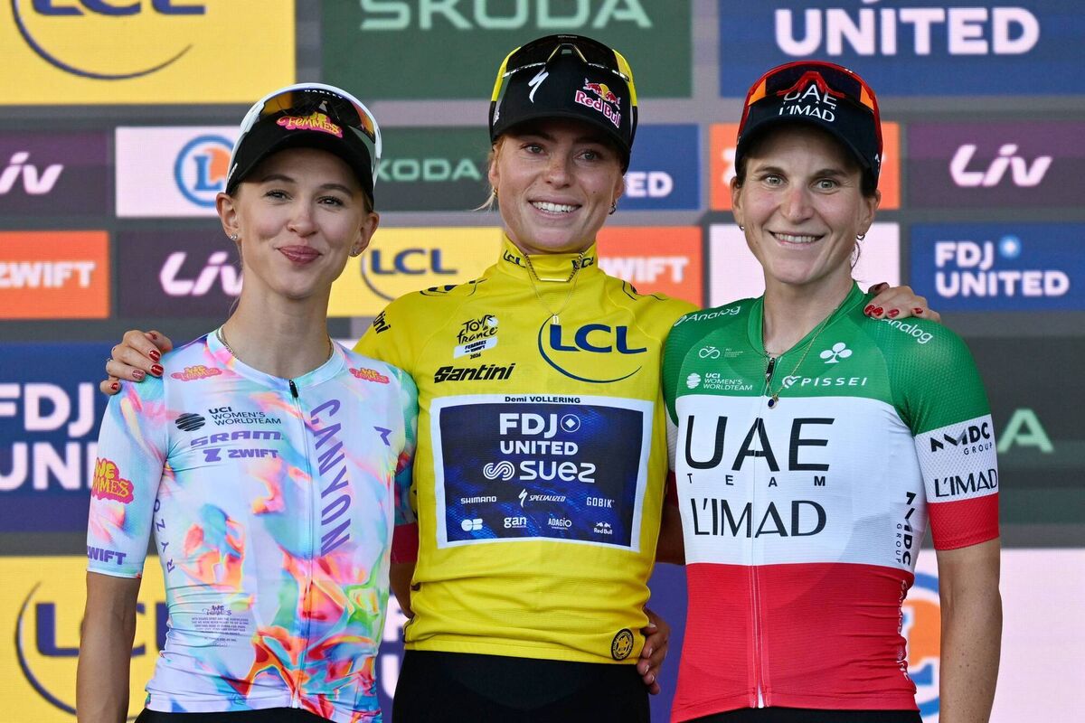 Winner Netherlands' Demi Vollering, centre, celebrates on the podium with Poland's Katarzyna Niewiadoma-Phinney, left, and Italy's Elisa Longo Borghini after the ninth stage of the Tour de France Femmes in Nice. Pic: Philippe Magoni/AP Winner Netherlands' Demi Vollering, centre, celebrates on the podium with Poland's Katarzyna Niewiadoma-Phinney, left, and Italy's Elisa Longo Borghini after the ninth stage of the Tour de France Femmes in Nice. Pic: Philippe Magoni/AP