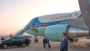 A catering truck is visible parked on the opposite side of Air Force One (Alex Brandon/AP)