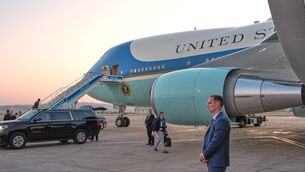 <p>A catering truck is visible parked on the opposite side of Air Force One (Alex Brandon/AP)</p>