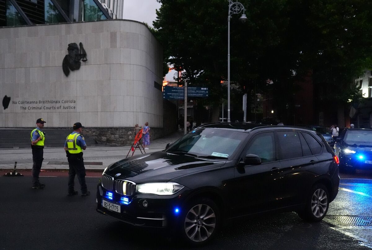 Garda vehicles leaving the Criminal Courts of Justice in Dublin, where Daniel Kinahan was remanded in custody, charged with directing an organised crime group, after being extradited from Dubai. Photo: Brian Lawless/PA Garda vehicles leaving the Criminal Courts of Justice in Dublin, where Daniel Kinahan was remanded in custody, charged with directing an organised crime group, after being extradited from Dubai. Photo: Brian Lawless/PA