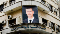 Photo of president Bashar al-Assad on a building in the capital city before the outbreak of the civil war - Damascus - Syria