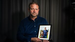 <p>Craig Coady holds a photograph of himself and Rory celebrating a sporting success. File picture: Chani Anderson</p> <p>Craig Coady holds a photograph of himself and Rory celebrating a sporting success. File picture: Chani Anderson</p>