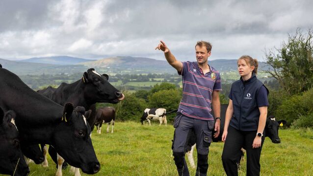 <p>Dairy farmer and Carbery supplier Tomás White with Carbery's new dedicated Farm Succession Officer, Ellen Hurley. Picture: Michael O'Sullivan/OSM</p>
