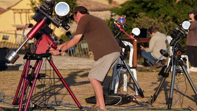 <p>Researchers from San Francisco's Exploratorium museum carrying out preparations for the global live broadcast of the today's total solar eclipse, in the abandoned village of Villalibado, near Burgos, northern Spain, earlier this week. Photo: Cesar MANSO / AFP via Getty Imaged</p>
